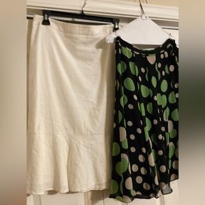 Two knee length skirts with zippers both size 12